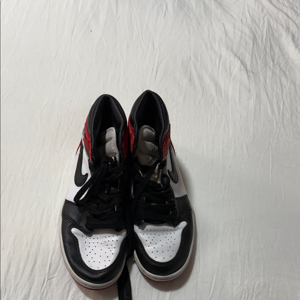 Nike Black and White Sneakers with Red Details
